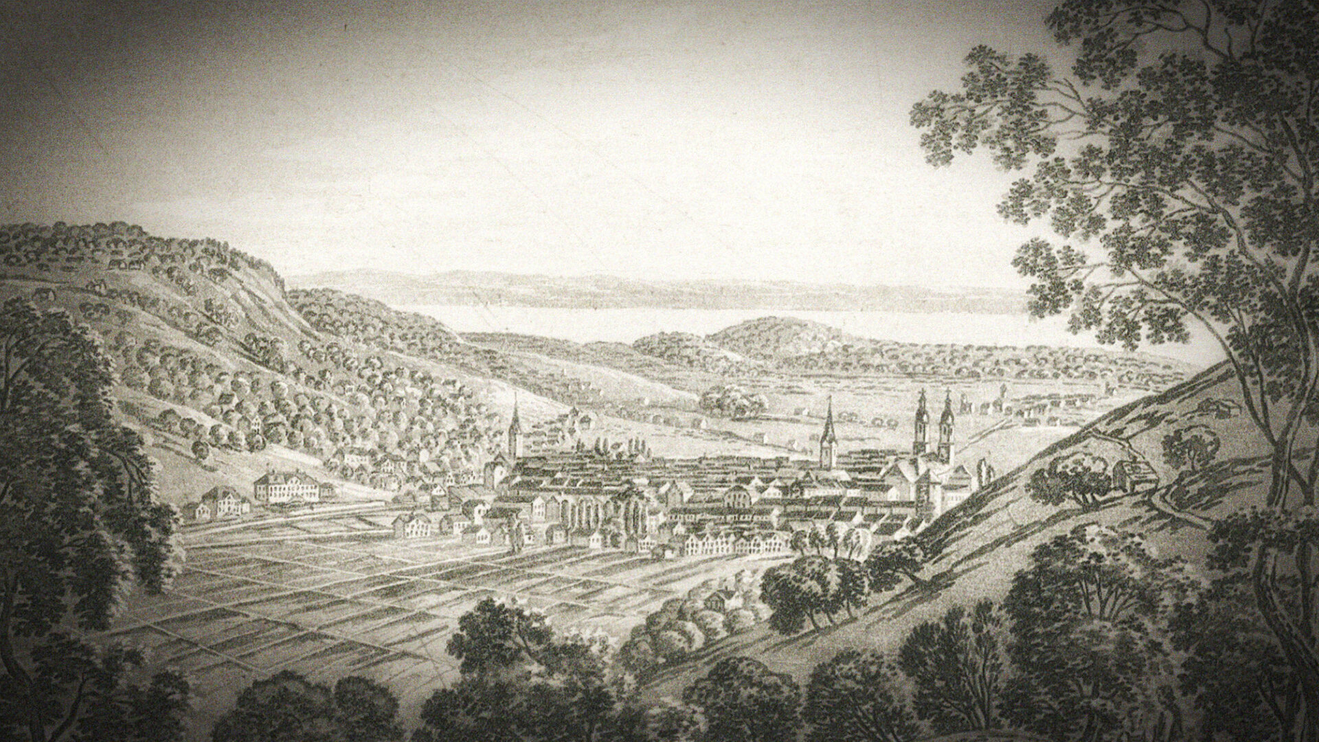 Historische Landschaftszeichnung mit Blick auf eine Stadt in einem Flusstal mit Hügeln.